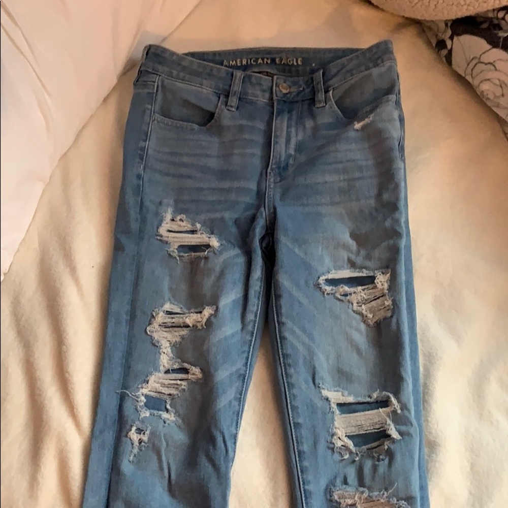 AE light wash distressed patched jeggings